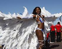 Masquerader in full carnival costume